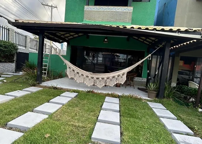 Linda casa frente mar pé na areia praia Flamengo